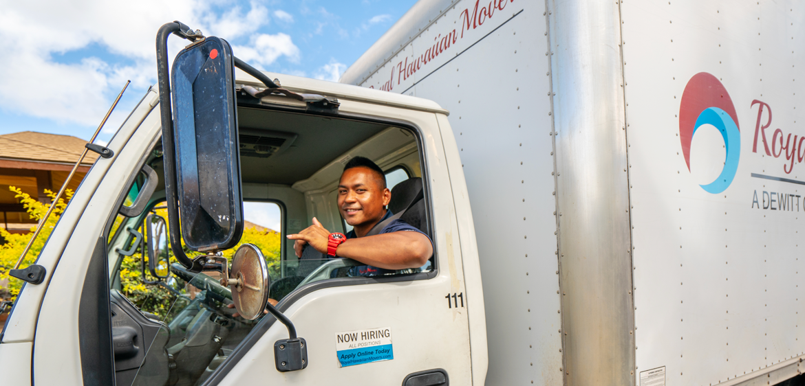 driver smiling and throwing shaka