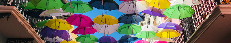 Bright Umbrellas handing above the street in Old San Juan Puerto Rico
