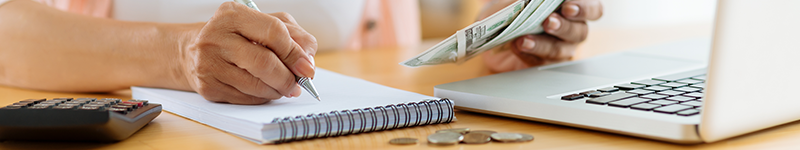 closeup of woman budgeting