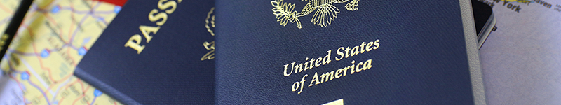 US passport over map