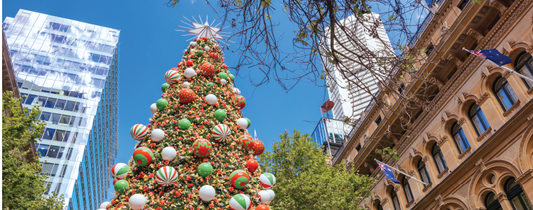 SYDNEY, AUSTRALIA DECEMBER 3 2023: Martin Place with Christmas tree, lights and decorations in the middle of a busy day in Sydney CBD, New South Wales, Australia